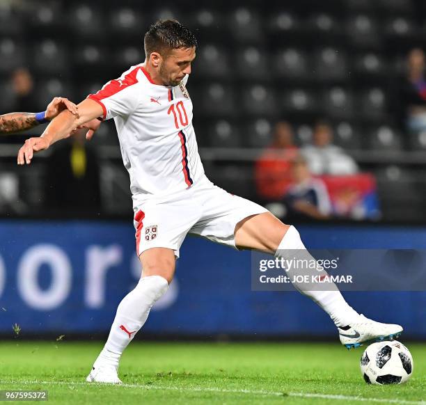 Serbia's Dusan Tadic controls the ball during the international friendly football match Serbia v Chile at the Merkur Arena in Graz, Austria on June...