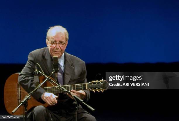 Brazilian musician Joao Gilberto acknowledges the audience during his presentation late at night on August 24, 2008 at the Teatro Municipal in Rio de...