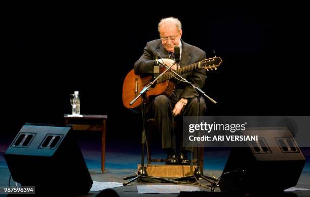 Brazilian musician Joao Gilberto acknowledges the audience during his presentation late at night on August 24, 2008 at the Teatro Municipal in Rio de...