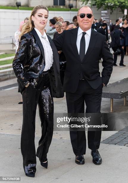 Actress Amber Heard and fashion designer Michael Kors are seen arriving to the 2018 CFDA Fashion Awards at Brooklyn Museum on June 4, 2018 in New...