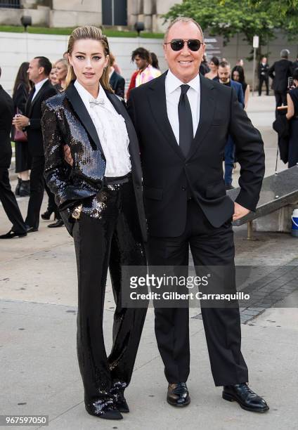 Actress Amber Heard and fashion designer Michael Kors are seen arriving to the 2018 CFDA Fashion Awards at Brooklyn Museum on June 4, 2018 in New...