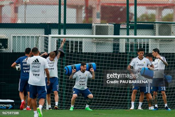 Argentina's forward Lionel Messi and teammates take part in a training session at the FC Barcelona 'Joan Gamper' sports centre in Sant Joan Despi...