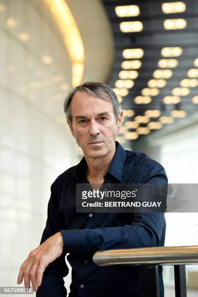 Belgian stage director Ivo Van Hove poses at the Bastille Opera in Paris on June 1, 2018.