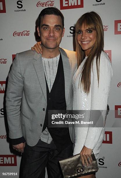 Robbie Williams and Ayda Field attend the Brit Awards after party held by EMI at the Supper Club on February 16, 2010 in London, England.