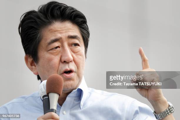 Japan's Prime Minister and ruling Liberal Democratic Party leader Shinzo Abe delivers a speech during a campaign for the July 21 Upper House election...