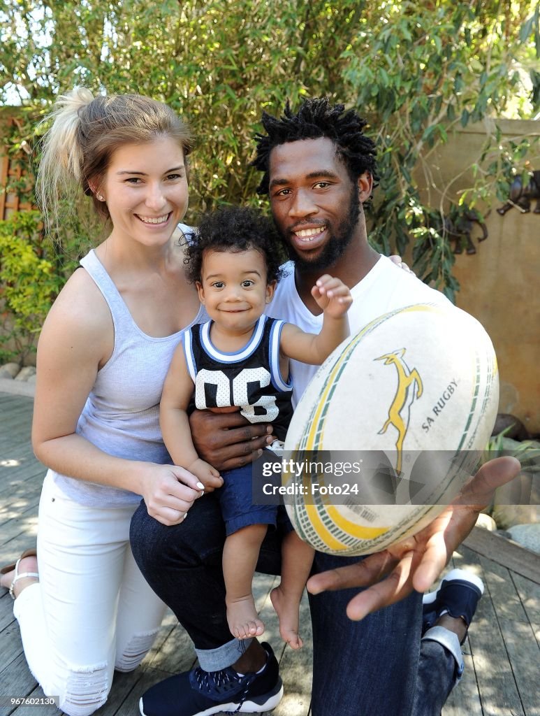 Siya Kolisi with his girlfriend Rachel Smith and their son