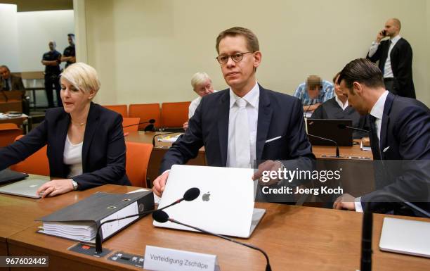 Anja Sturm, Wolgang Heer and Wolgang Stahl, lawyers of main defendant Beate Zschaepe, prepare for their pleas as Holger G. Looks on during the trial...