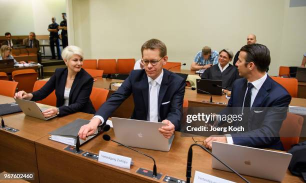 Anja Sturm, Wolgang Heer and Wolgang Stahl, lawyers of main defendant Beate Zschaepe, prepare for their pleas as Holger G. Looks on during the trial...