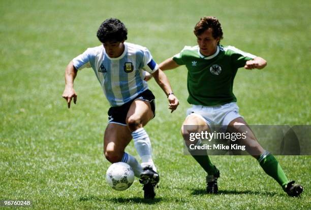 Diego Maradona of Argentina and Lothar Matthaeus of Germany in action during the FIFA World Cup final on 29 June 1986 against West Germany at the...