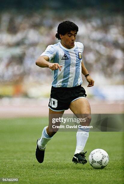 Diego Maradona of Argentina running with the ball against the Republic of Korea during the Group A match at the 1986 FIFA World Cup on 2 June 1986 at...