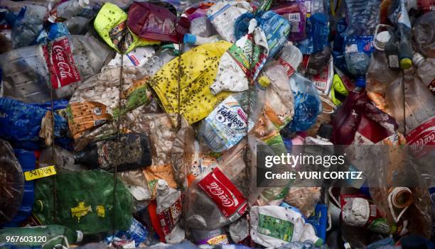 Compacted bales of plastic bottles at the "Bordo Poniente" garbage dump in Mexico City, on January 18, 2012. Some six thousand tons of garbage from...