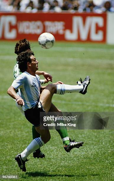 Thomas Berthold of West Germany challenges Jose Cuciuffo of Argentina during the FIFA World Cup final on 29 June 1986 at the Azteca Stadium in Mexico...