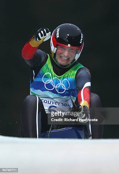 Tatjana Huefner of Germany celebrates after competing in the Luge Women's Singles on day 5 of the 2010 Winter Olympics at Whistler Sliding Centre on...