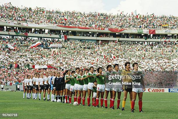The players for Mexico and West Germany line up before the 1986 FIFA World Cup Quarter Final on 21 June 1986 at the Universitario Stadium in...