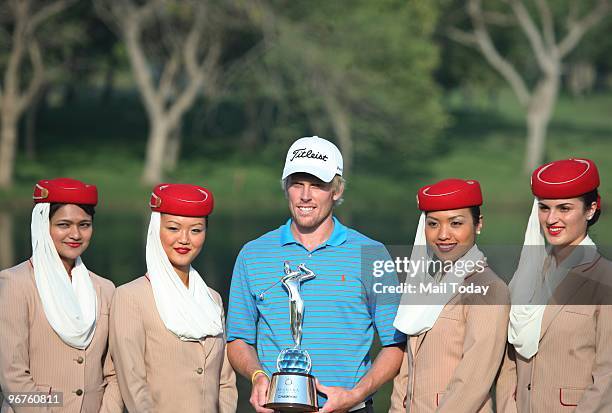 Australian Golfer Andrew Dodt with the Avantha Masters trophy at the DLF Golf and Country Club on Sunday, February 14, 2010.