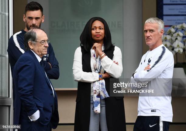 French Sports Minister Laura Flessel speaks with France's goalkeeper Hugo Lloris, French Football Federation President Noel Le Graet and France's...