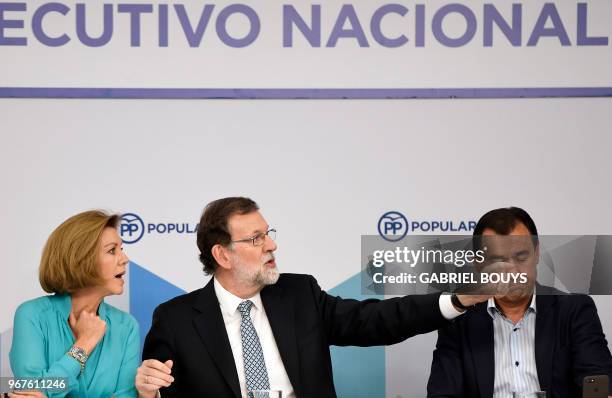 Former Spanish prime minister Mariano Rajoy , General Secretary of People's Party Maria Dolores de Cospedal and PP spokesman Fernando Martinez Maillo...