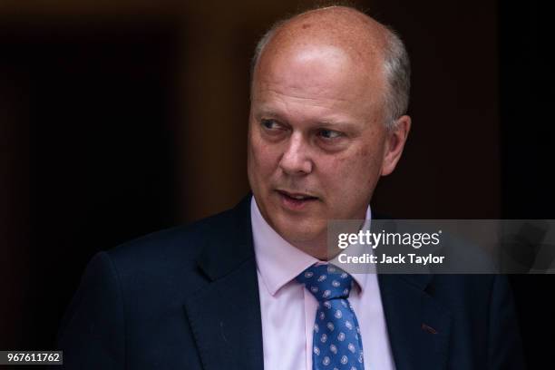 Transport Secretary Chris Grayling leaves after a Cabinet meeting chaired by British Prime Minister Theresa May at 10 Downing Street on June 5, 2018...