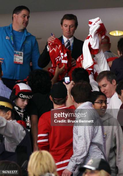 Wayne Gretzky signs autographs before the ice hockey men's preliminary game between Canada and Norway on day 5 of the Vancouver 2010 Winter Olympics...