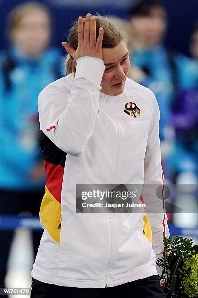 Jenny Wolf of Germany reacts after finishing second to Lee Sang-Hwa of South Korea during the women's speed skating 500 m on day five of the...