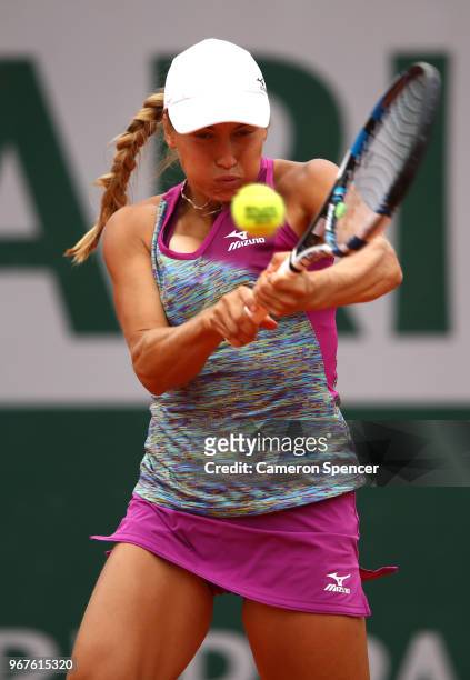 Yulia Putintseva of Kazhakstan plays a backhand during the ladies singles quarter finals match against Madison Keys of The United States during day...
