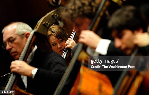 Marietta Feltkemp on double bass rehearse with members of The Royal Concertgebouw Orchestra of Amsterdam before a performance at the Kennedy Center...