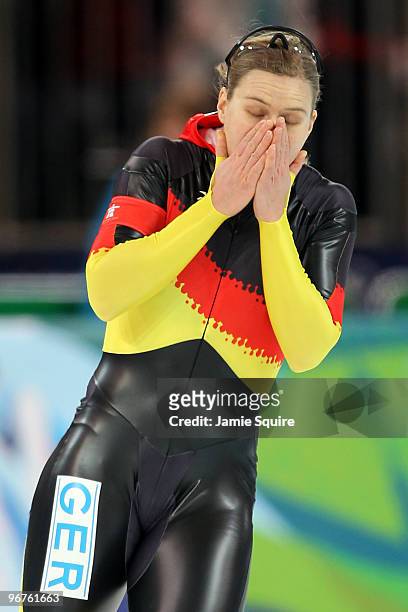 Jenny Wolf of Germany reacts after finishing second to Lee Sang-Hwa of South Korea during the women's speed skating 500 m on day five of the...