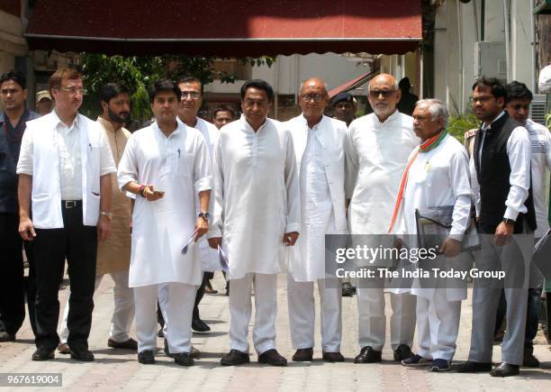 Congress Madhya Pradesh President Kamal Nath with senior Congress leaders Jyotiraditya Scindia and Digvijaya Singh after a meeting with the Election...