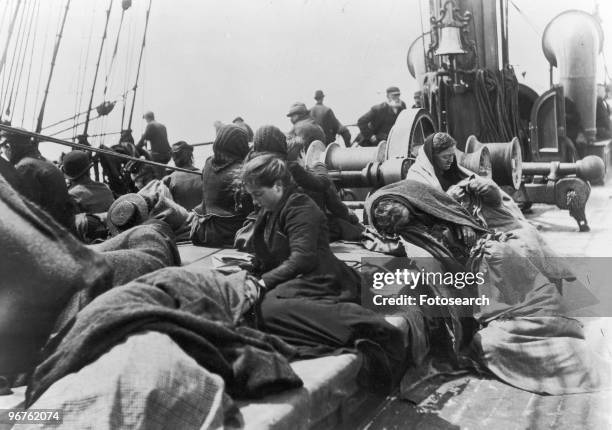 Photograph of Immigrants aboard the S.S Pennland heading to Ellis Island circa 1888.