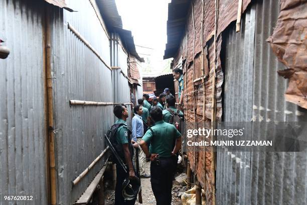 Bangladesh police conduct a drive against narcotics in Dhaka on June 5, 2018. - More than 100 alleged drug dealers have been killed and thousands...