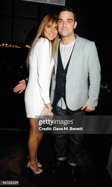 Ayda Field and Robbie Williams attend the Brit Awards after party held by EMI at the Supper Club on February 16, 2010 in London, England.