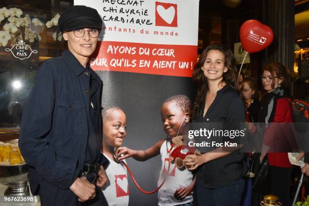 Ines de La Fressange and actress Lucie Lucas attend Petits Dejeuners du Coeur Mecenat Chirurgie Cardiaque Children Care Auction Breakfeast at Cafe de...