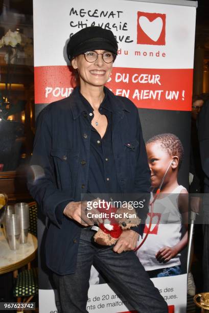Ines de La Fressange attends Petits Dejeuners du Coeur Mecenat Chirurgie Cardiaque Children Care Auction Breakfeast at Cafe de La Paix on June 5,...