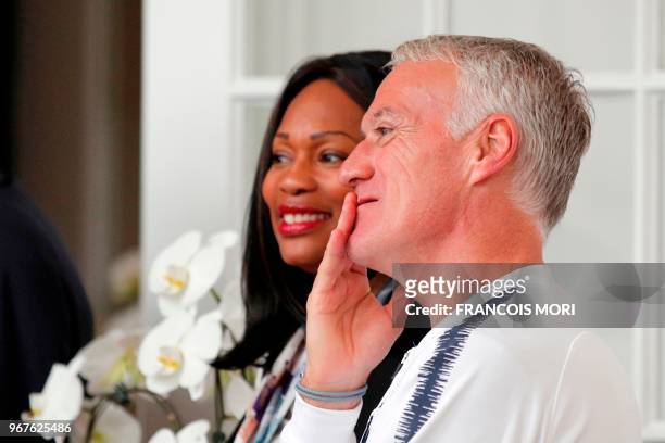French football national team's head coach Didier Deschamps and French minister of sport, Laura Flessel wait for the arrival of French President...