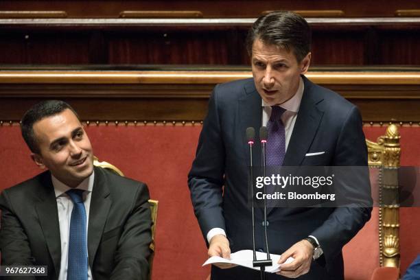 Giuseppe Conte, Italy's prime minister, right, delivers his maiden speech to the Senate as Luigi Di Maio, Italy's deputy prime minister, looks on in...