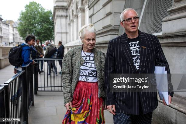 British fashion designer Dame Vivienne Westwood and her son Joe Corre arrive at Downing Street after staging an anti-fracking protest with...