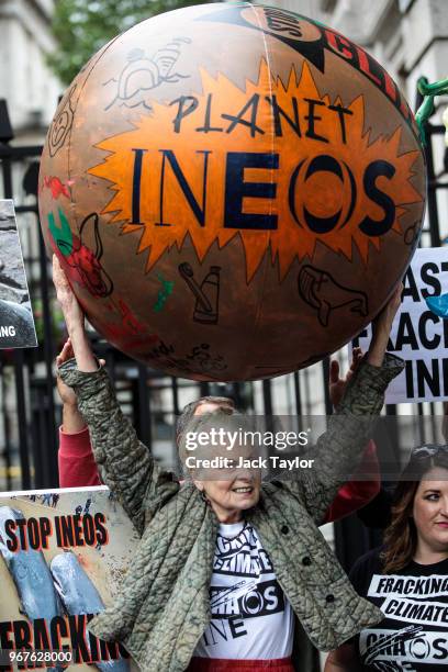 British fashion designer Dame Vivienne Westwood hold an inflatable ball as she and her son Joe Corre stage an anti-fracking protest with campaigners...