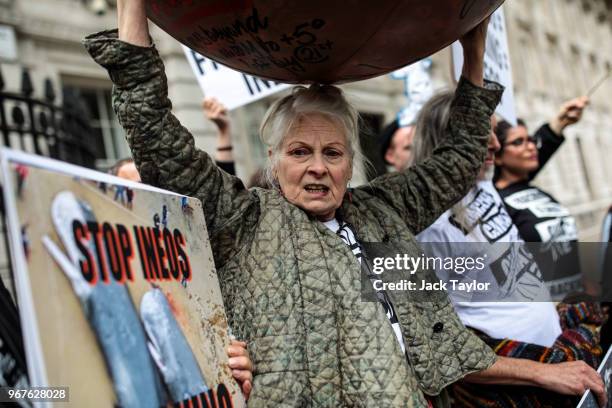 British fashion designer Dame Vivienne Westwood and her son Joe Corre stage an anti-fracking protest with campaigners outside Downing Street on June...