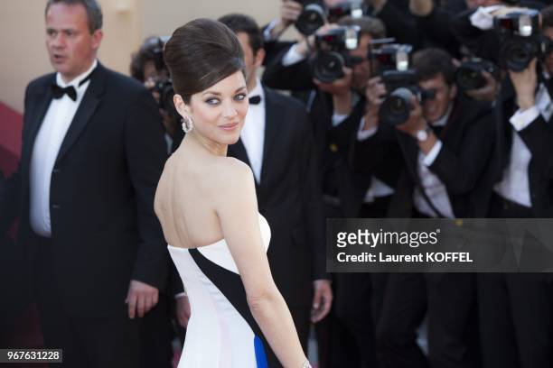 Marion Cotillard attends the premiere of 'Blood Ties' during the 66th Annual Cannes Film Festival at the Palais des Festivals on May 20, 2013 in...