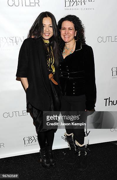 Designer Thuy Diep and actress Susie Essman poses backstage at the Thuy Fall 2010 Fashion Show during Mercedes-Benz Fashion Week at the Salon at...