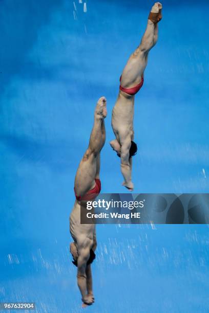 Cao yuan and Xie siyi of China compete in the man's 3m Synchro Springboard final on FINA Diving World Cup 2018 at the Wuhan Sports Center on June 5,...