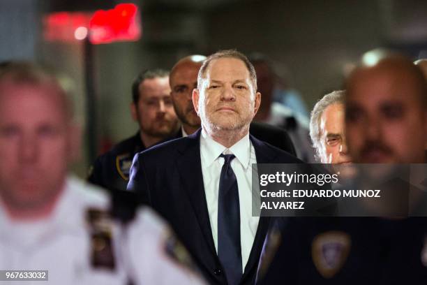 Hollywood film producer Harvey Weinstein enters Manhattan criminal court June 5, 2018 in New York. Weinstein pleaded not guilty to rape and sexual...