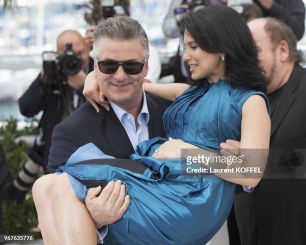 Alec Baldwin and Hilaria Baldwin attend the photocall for 'Seduced and Abandoned' during The 66th Annual Cannes Film Festival at Palais des Festivals...