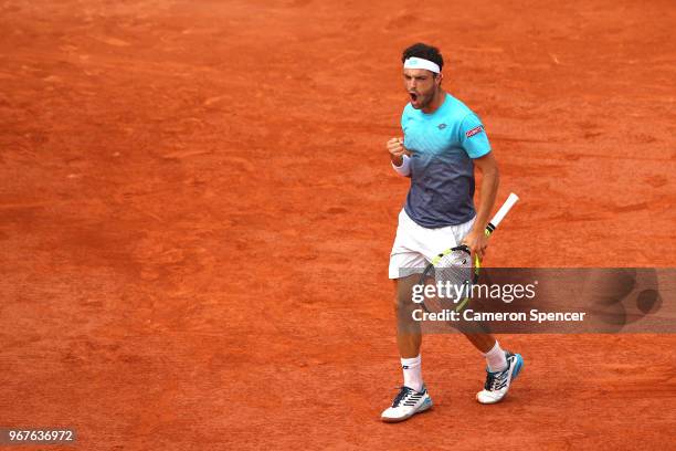 Marco Cecchinato of Italy celebrates during the mens singles quarter finals match against Novak Djokovic of Serbia during day ten of the 2018 French...