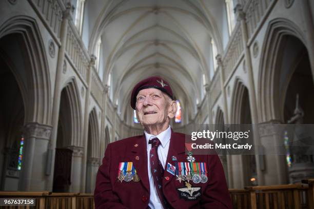 Ray Shuck who was a paratrooper on D-Day and was later shot in the head by a German sniper sits inside the church in Ranville where he was given the...
