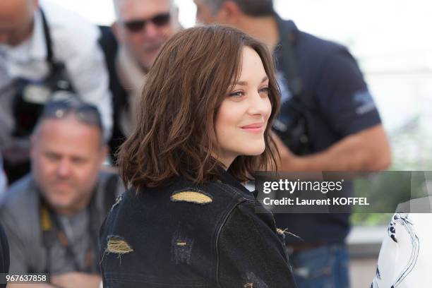 Marion Cotillard attends the 'From The Land And The Moon ' Photocall during the 69th annual Cannes Film Festival at the Palais des Festivals on May...