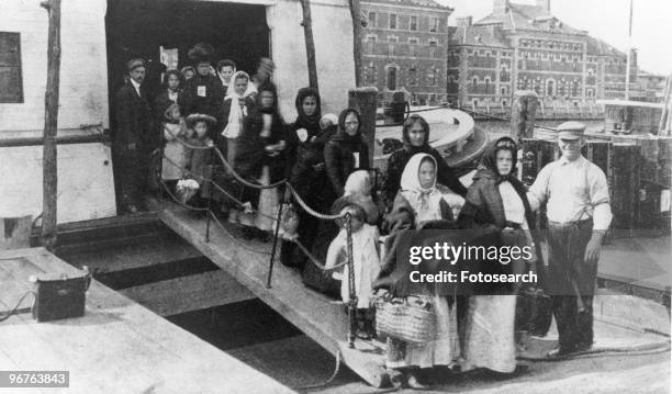 Photograph of the Arrival of Immigrants to Ellis Island, New York circa 1880.