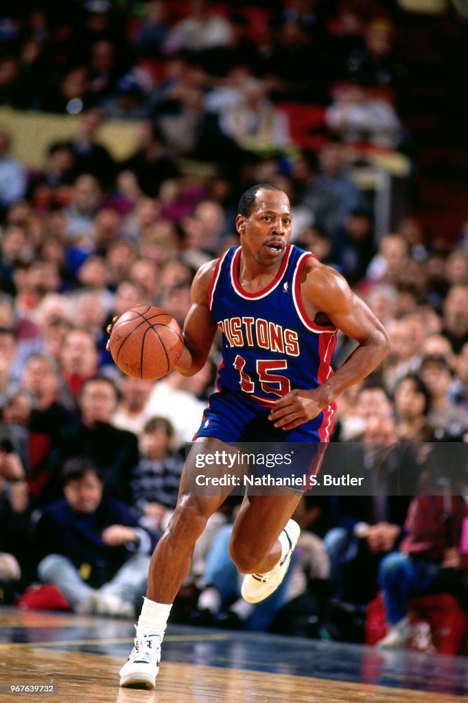 Vinnie Johnson of the Detroit Pistons handles the ball circa 1991 at ...
