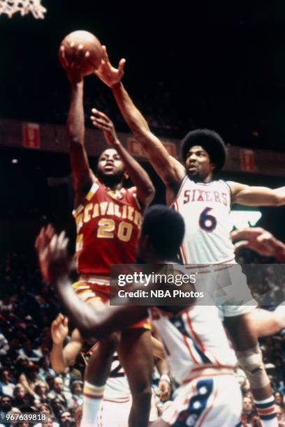 Julius Erving of the Philadelphia 76ers attempts to block a shot against the Cleveland Cavaliers circa 1978 at The Spectrum in Philadelphia,...