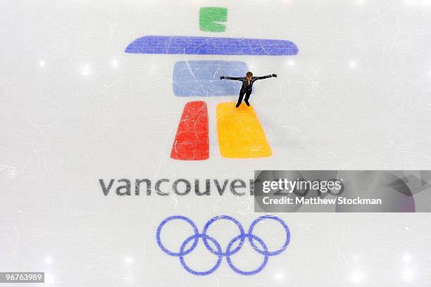 Evgeni Plushenko of Russia competes in the men's figure skating short program on day 5 of the Vancouver 2010 Winter Olympics at the Pacific Coliseum...